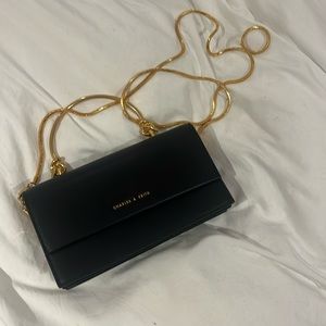 Black and gold purse